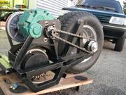 Powertrain assembled on the swing arm